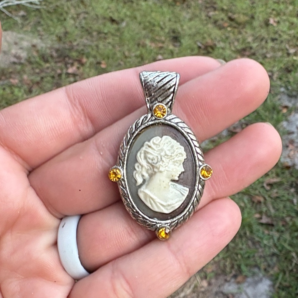 Elegant Silver and Cream Cameo Pendant